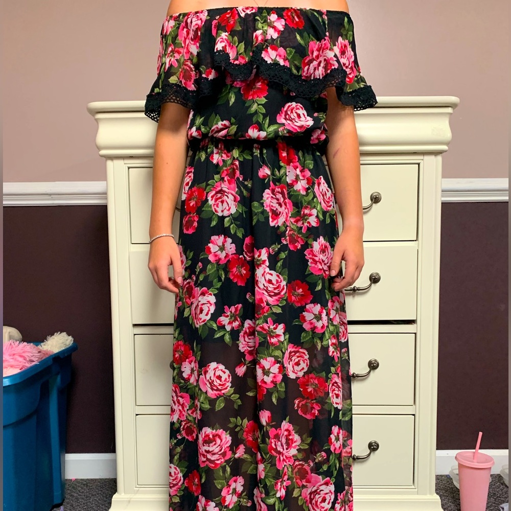 Long black off the shoulder floral dress.